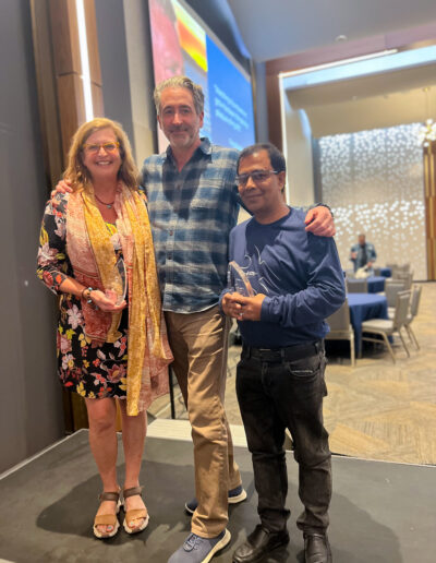 Lisa Rinaman with Waterkeeper Alliance CEO Marc Yaggi and fellow 2024 Terry Backer Award Winner Tofazzal Sohel, Bangladesh’s Khowai River Waterkeeper