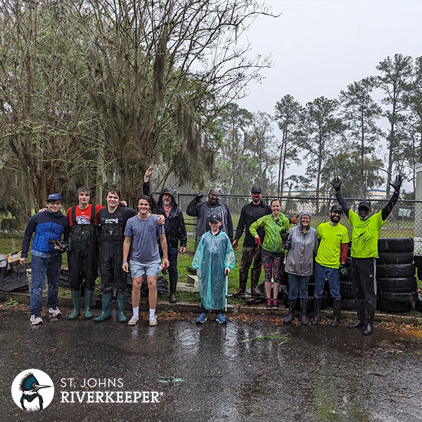 Riverview Park cleanup crew in the rain