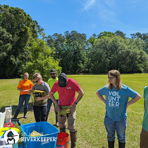 volunteers getting briefed before a cleanup