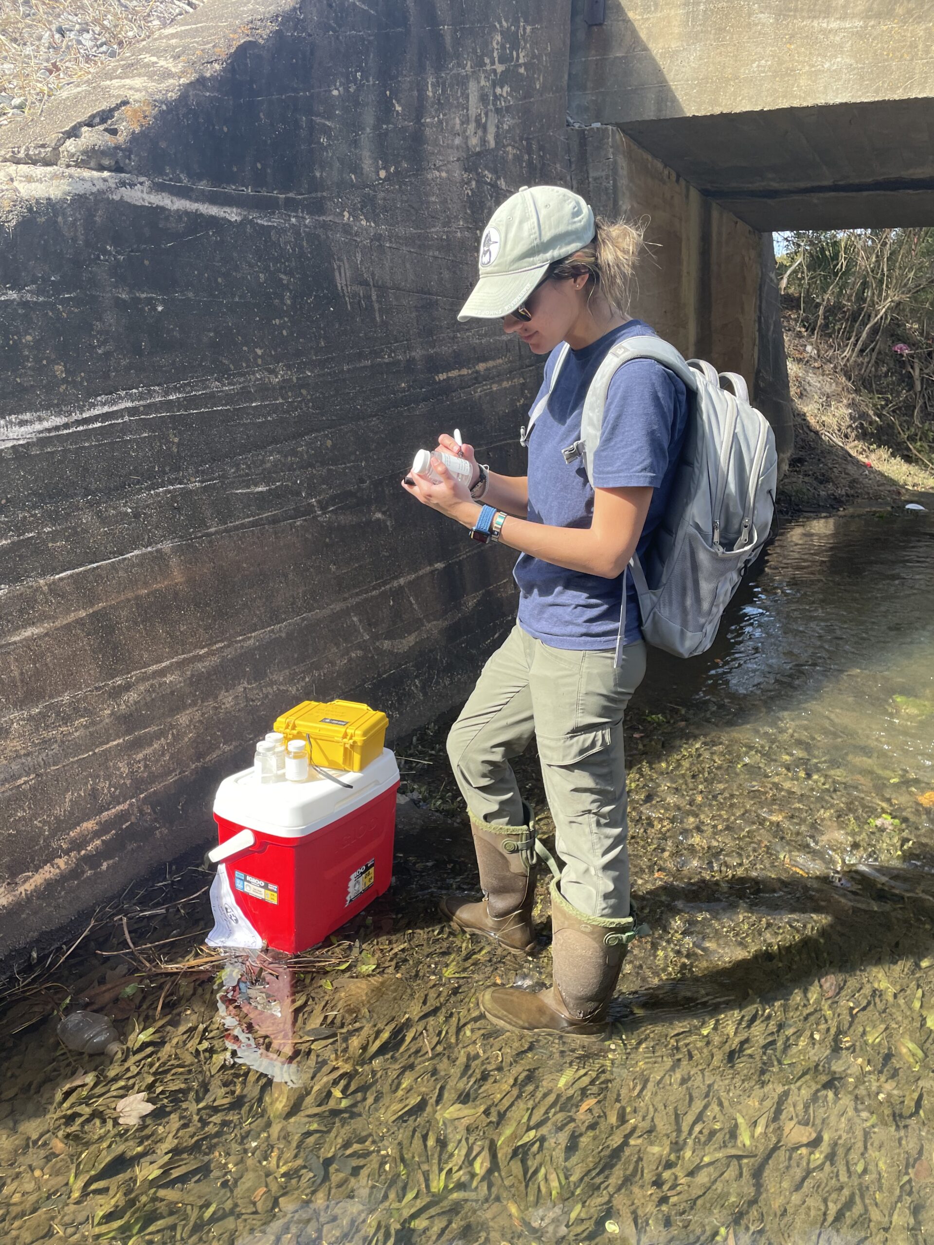 Water Sample collecting on Moncrief Creek