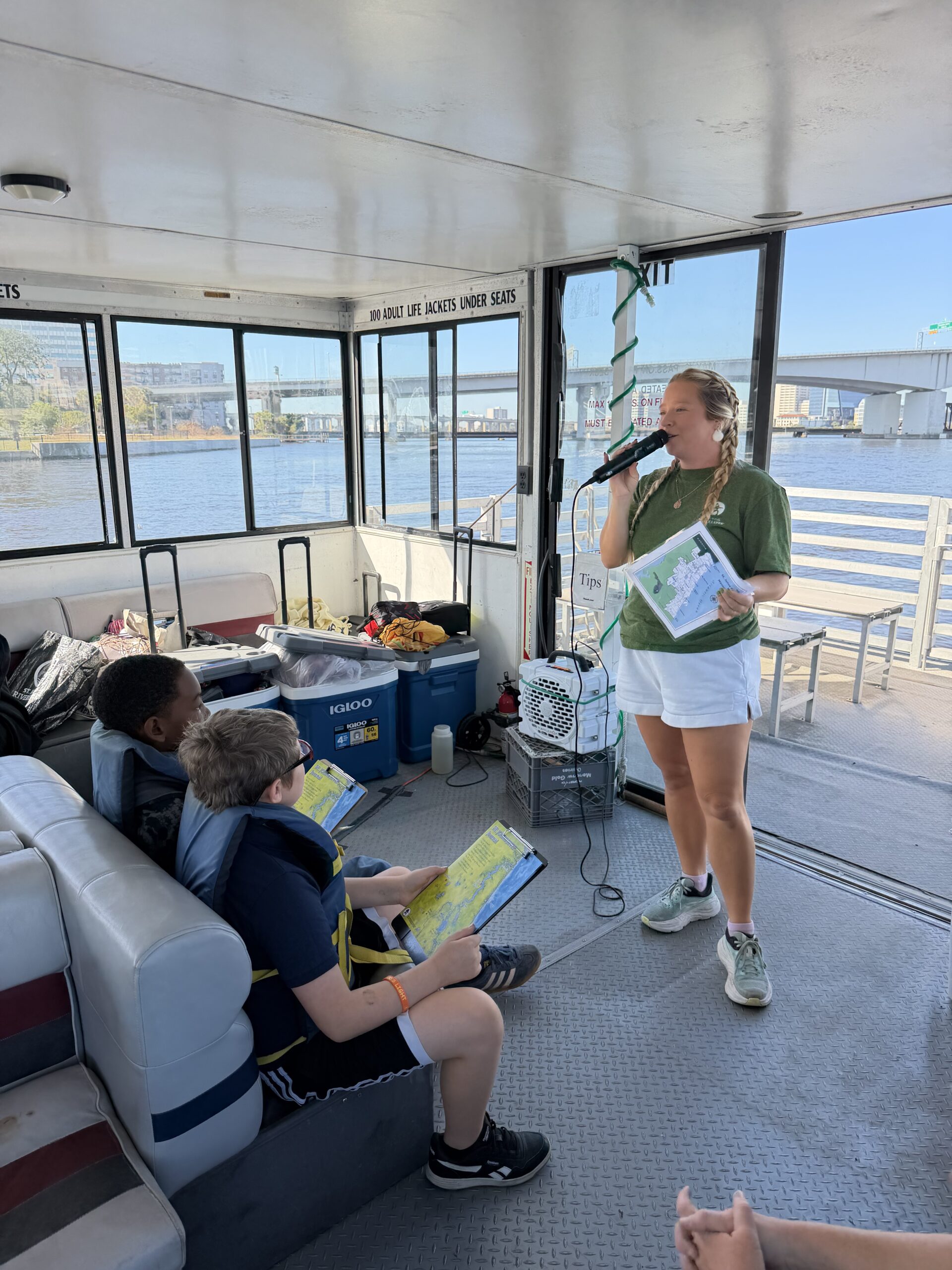 education specialist leading an educational RiverX boat tour