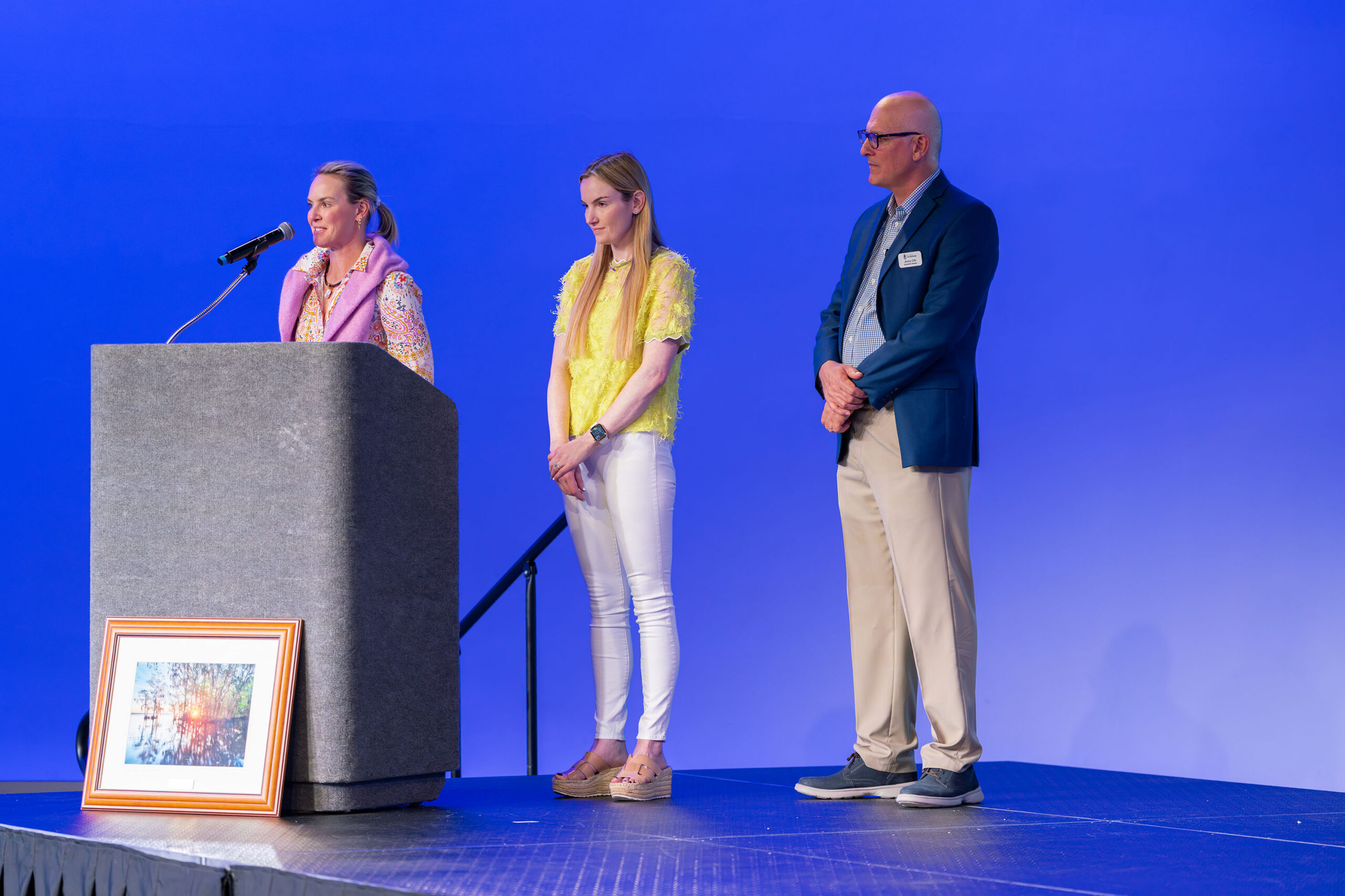 Tommy Davis' daughters speaking at the State of the Watershed event